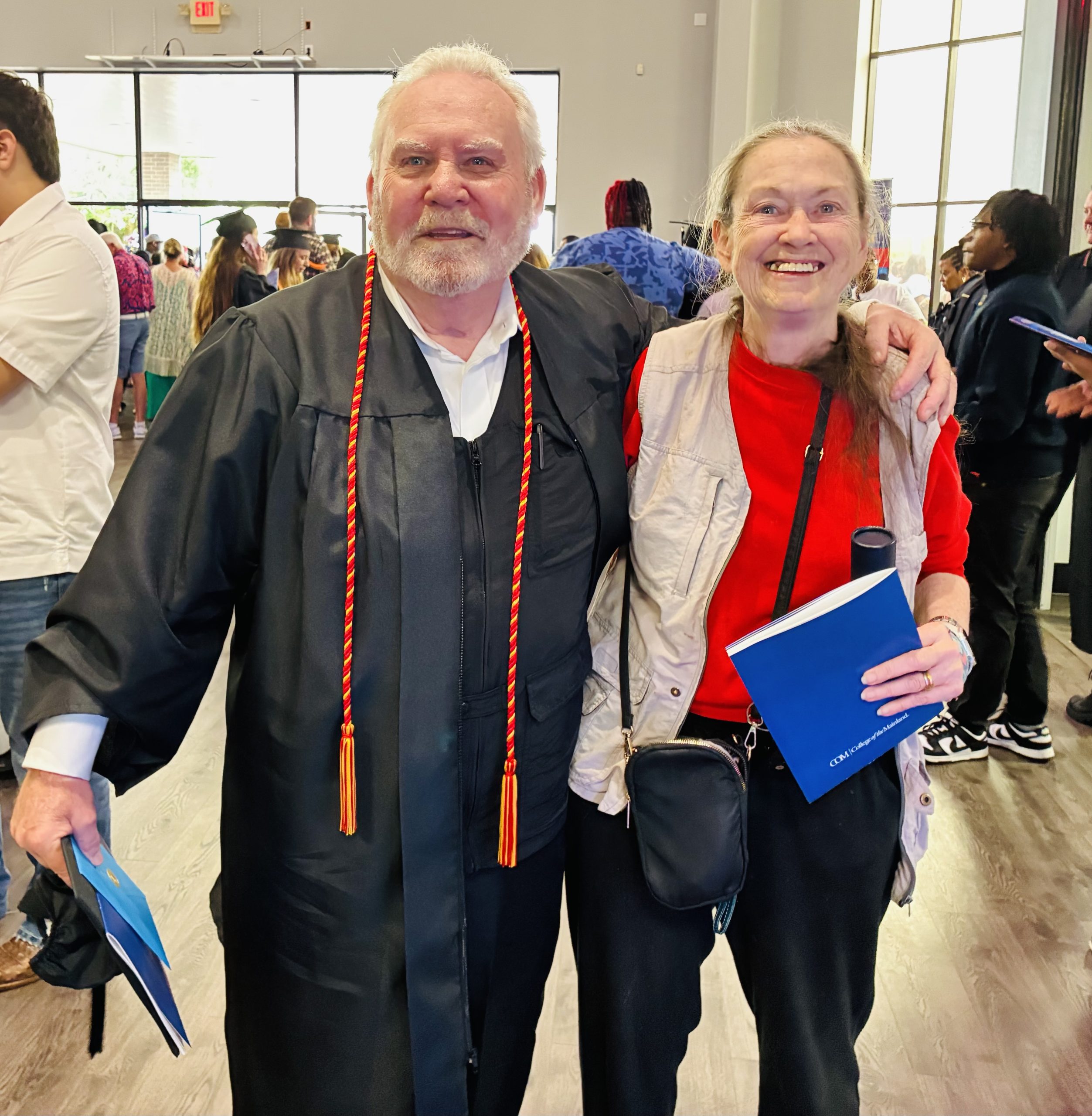Chris Ward at his graduation with his wife